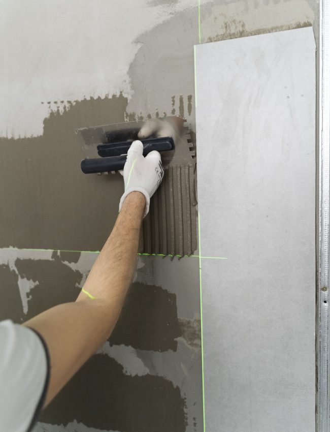 tiler-working-renovation-apartment